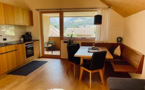 Kuchyňa alebo kuchynka v ubytovaní hus56