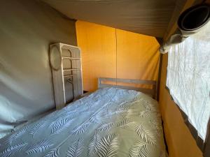 Glamping de Hof van Eeden客房内的一张或多张床位