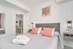 Ένα ή περισσότερα κρεβάτια σε δωμάτιο στο Molina 2