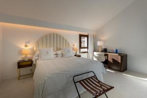 Postel nebo postele na pokoji v ubytování P SANTA CLARA HOTEL BOUTIQUE By Sojo + 249 fotografií