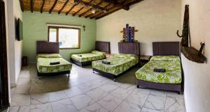 Ένα ή περισσότερα κρεβάτια σε δωμάτιο στο Hotel Monteverde Sutatausa