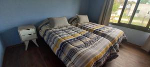 Katil atau katil-katil dalam bilik di Casa quinta con pileta - Gardey
