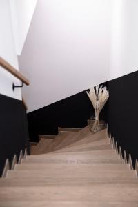 a set of stairs with a plant on the top at Bob W Bonn Zentrum in Bonn