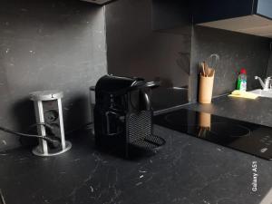 Nhà bếp/bếp nhỏ tại Studio cosy en centre-ville