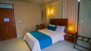 Llit o llits en una habitació de Dream Inn PR