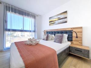 Postel nebo postele na pokoji v ubytování Santa Rosalia Lake & Life Resort - 4510 + 91 fotografií