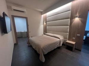Voodi või voodid majutusasutuse Hotel Ristorante Borgo Antico toas