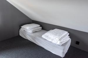 Postel nebo postele na pokoji v ubytování Eidebua