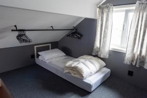 Postel nebo postele na pokoji v ubytování Eidebua