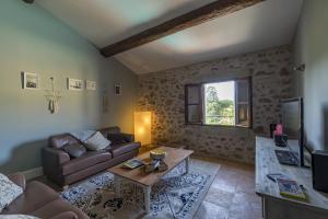 Posezení v ubytování Maison Dix Chambres d'hôtes et Espace SPA Bien être