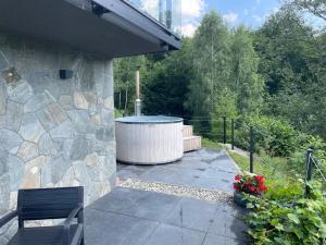 Vonkajšia záhrada v ubytovaní Apartamenty 'Okno z widokiem'