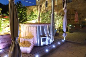 Zahrada ubytování Maison Dix Chambres d'hôtes et Espace SPA Bien être