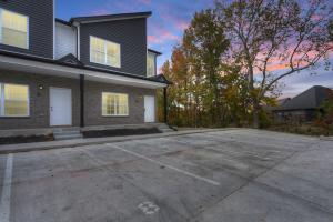 a large parking lot in front of a house at Waiting to Excell in Clarksville