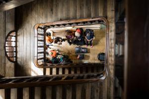 a mirror on a wall with a bunch of toys at Accueil du Couvent de Malet in Saint-Côme-dʼOlt