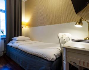 Postel nebo postele na pokoji v ubytování Best Western Hotel Bentleys