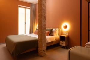 The Loft House Madrid客房内的一张或多张床位