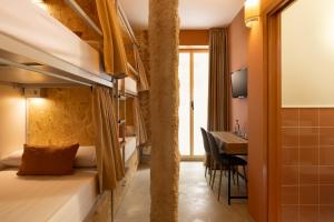 The Loft House Madrid客房内的一张或多张床位