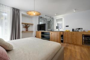 Η κουζίνα ή μικρή κουζίνα στο Exclusive Rooms Porto