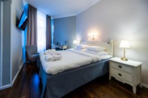 Postel nebo postele na pokoji v ubytování Best Western Hotel Bentleys