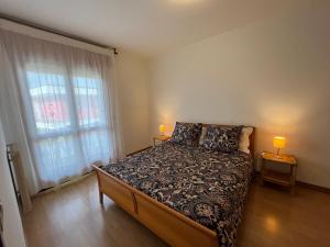 Ένα ή περισσότερα κρεβάτια σε δωμάτιο στο Casa Vacanze Rina