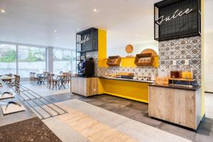 Kuchyň nebo kuchyňský kout v ubytování B&B HOTEL Mons Gare