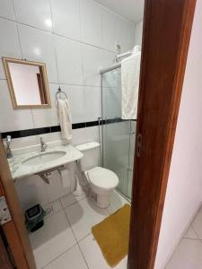 Vannituba majutusasutuses Apt com varanda no centro