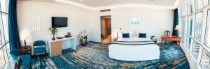 TV a/nebo společenská místnost v ubytování Taj Park Hotel