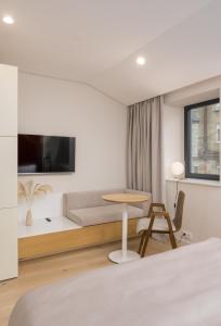 TV a/nebo společenská místnost v ubytování Sophia Hotel Kyiv
