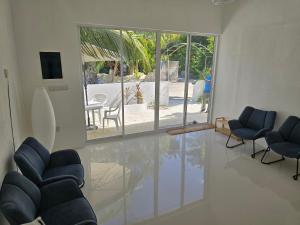Posezení v ubytování Casa De Himandhoo