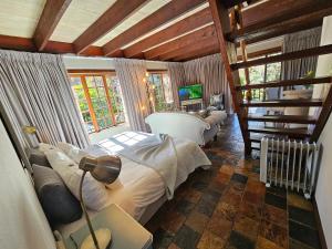 Χώρος καθιστικού στο Tsitsikamma Gardens Self-Catering Cottages - Cottage #2