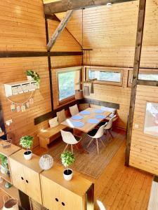 an overhead view of a room with a table and chairs at Chalet 22 Bernau in Bernau im Schwarzwald