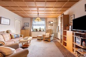 Μια τηλεόραση ή/και κέντρο ψυχαγωγίας στο Ferienhaus Marchlewski