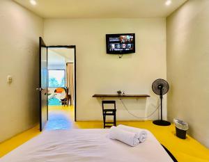 Postel nebo postele na pokoji v ubytování Amalaya Hostel