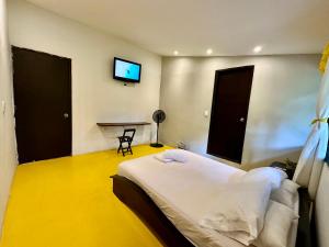 Postel nebo postele na pokoji v ubytování Amalaya Hostel