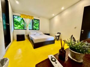 Postel nebo postele na pokoji v ubytování Amalaya Hostel