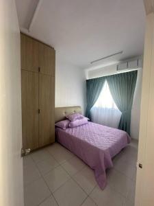 Ένα ή περισσότερα κρεβάτια σε δωμάτιο στο HomestayDin bangi wonderland