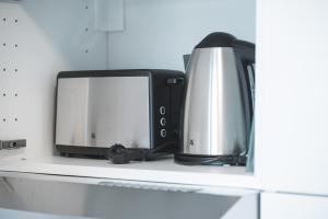 Η κουζίνα ή μικρή κουζίνα στο Wohlfühl-Apartment I Zentral I Balkon I Küche