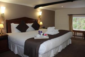 Ein Bett oder Betten in einem Zimmer der Unterkunft The Frocester