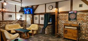 Część wypoczynkowa w obiekcie Apartamenty Komarno 46 Jacuzzi&Sauna