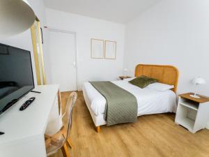 TV a/nebo společenská místnost v ubytování Hotel Joly