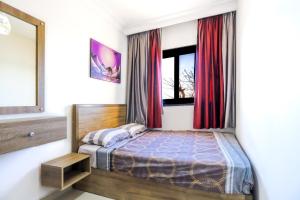 Ένα ή περισσότερα κρεβάτια σε δωμάτιο στο Sky View Honeymoon