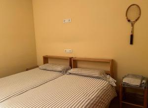 Postel nebo postele na pokoji v ubytování Check-in Casas Alvaro