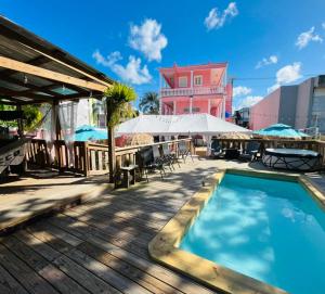 a swimming pool on the deck of a building at Hotel Libertad in Lares