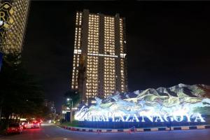 a large building with a sign in front of it at Royal Suites Studio 26RU - Citra Plaza Nagoya in Jodoh