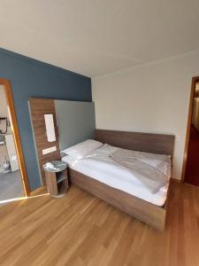 Postelja oz. postelje v sobi nastanitve Hotel Post Glarnerhof