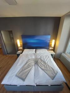 Postelja oz. postelje v sobi nastanitve Hotel Post Glarnerhof