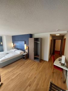 Postelja oz. postelje v sobi nastanitve Hotel Post Glarnerhof