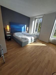 Postelja oz. postelje v sobi nastanitve Hotel Post Glarnerhof