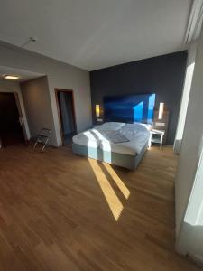 Postelja oz. postelje v sobi nastanitve Hotel Post Glarnerhof
