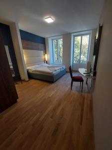 Postelja oz. postelje v sobi nastanitve Hotel Post Glarnerhof